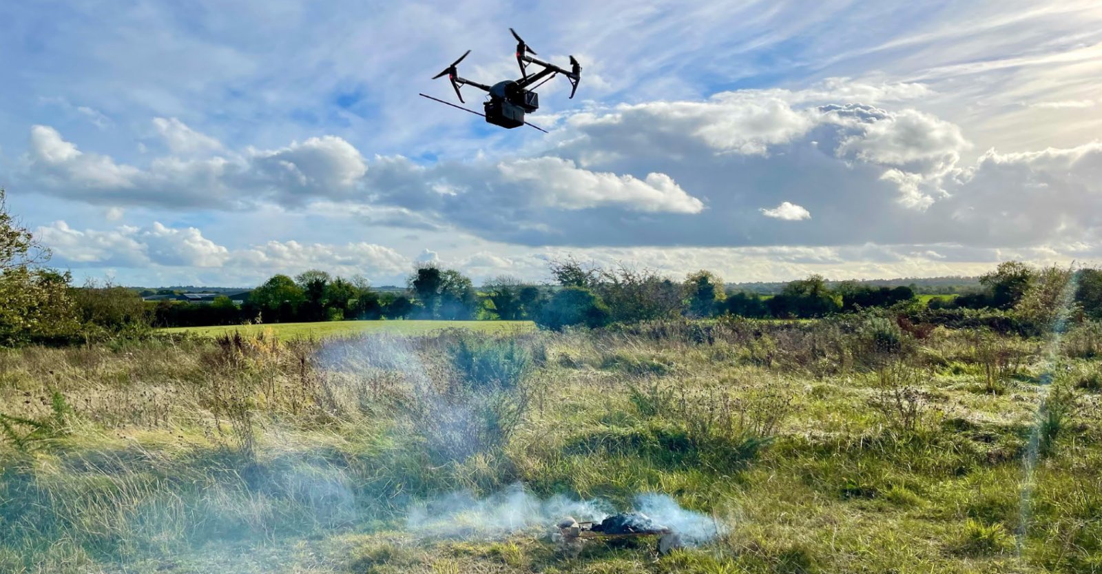 DR2000 drone sampling air above a smoke plume for mercury emissions monitoring